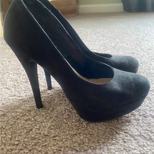 Black suede platform pumps